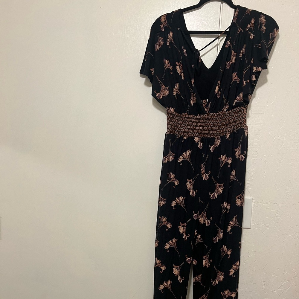 Black floral jumpsuit from Anthropologie